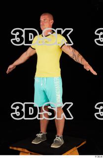 0010 Whole body yellow shirt turquoise shorts brown shoes of…